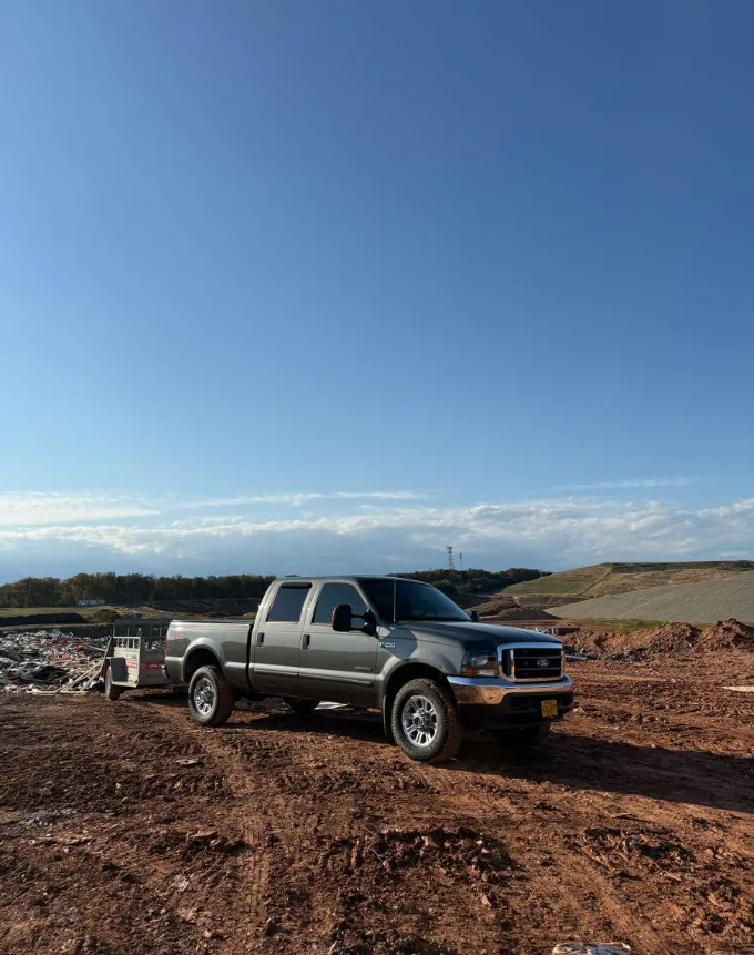 Bennett's Ford F-250 and dump trailer at the landfill after a Loudoun County haul-off